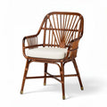 Sedia in rattan con cuscino in tessuto beige misura 80 x 70 x 90cm